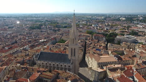 Aerial-flight-around-Sainte-Anne-church-Montpellier-ecusson
